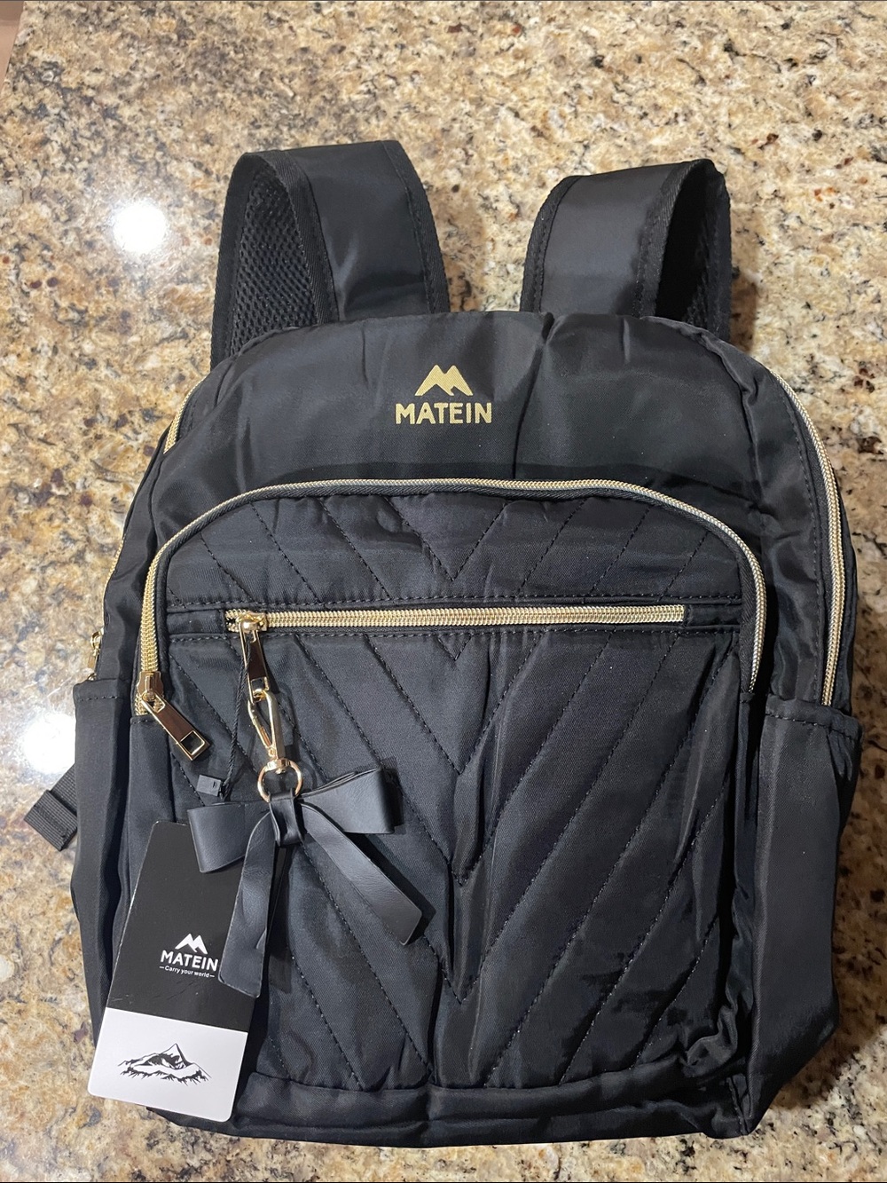 Matein Black Quilted Backpack with Gold Accents